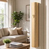 The Modern Waterproof Gold Aluminum Outdoor Mezuzah Cover affixed to a doorpost