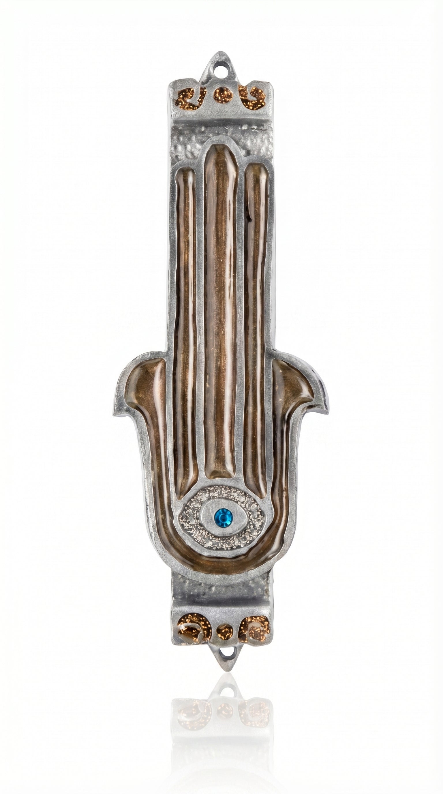 Amber Hamsa mezuzah case in hand-painted pewter enamel with earthy amber and rust tones. Made in Israel with a bold protective motif.