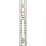 timeless and modern Mezuzah case with gold embellishments on a white background