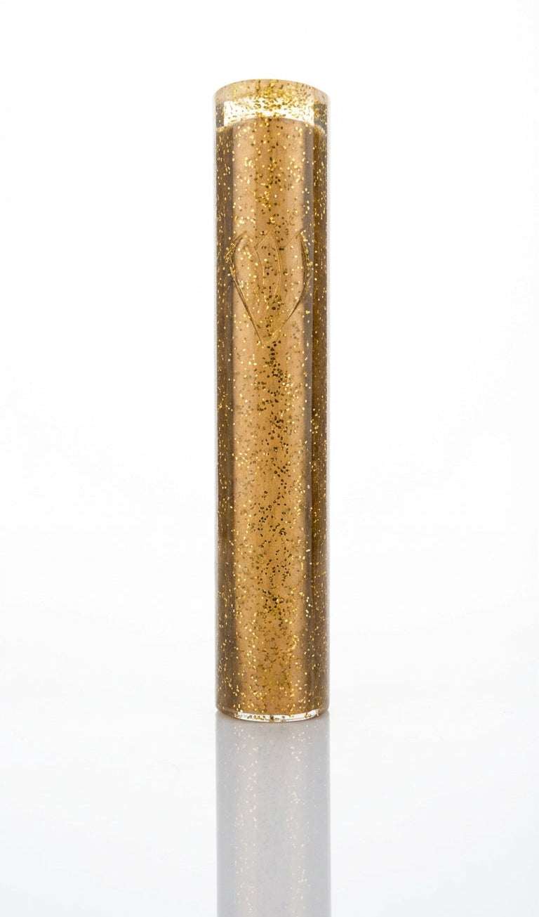 Gold cylindrical mezuzah case on a white background