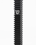 Modern Black Steps Aluminum Mezuzah, showing its deep black waterproof body, repeated raised horizontal steps, narrow rectangular profile, and centered silver Hebrew Shin