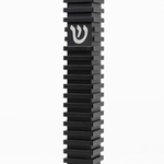 Modern Black Steps Aluminum Mezuzah, showing its deep black waterproof body, repeated raised horizontal steps, narrow rectangular profile, and centered silver Hebrew Shin