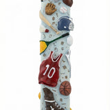 Decorative mezuzah case with sports-themed figurines on a white background