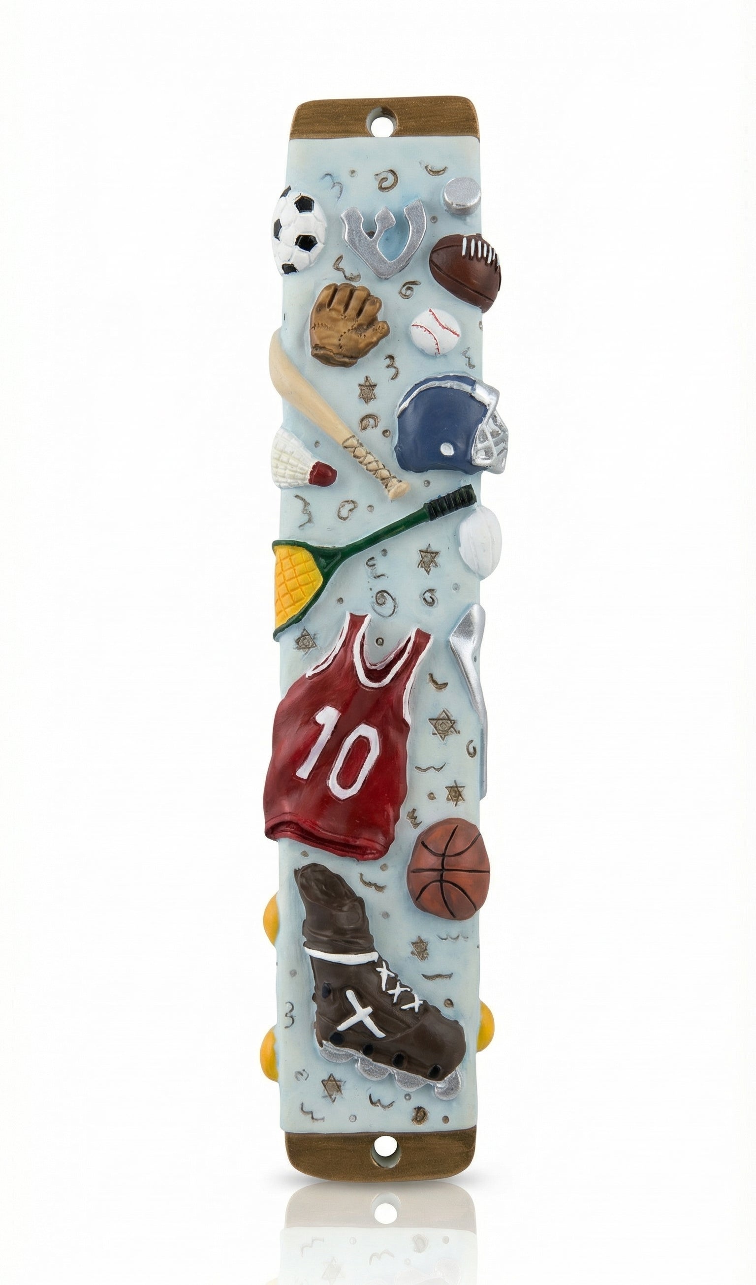 Decorative mezuzah case with sports-themed figurines on a white background