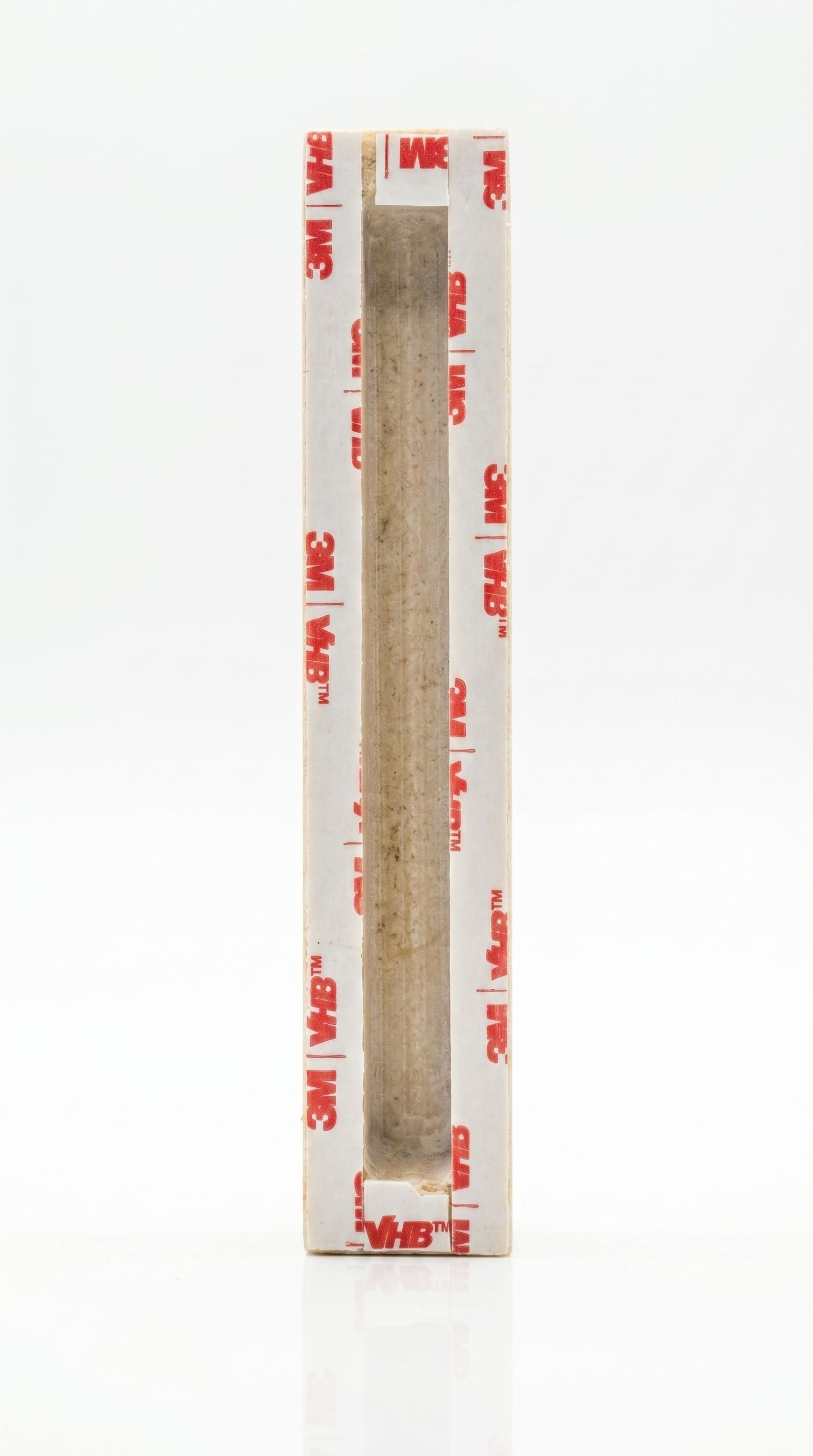 Back of Threefold Blessing black lettering Jerusalem stone mezuzah showing recessed chamber and included mounting tape