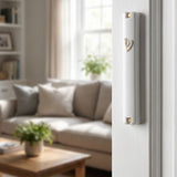 Timeless White Gold Shin Outdoor Mezuzah mounted on a white doorpost in a bright modern Jewish home