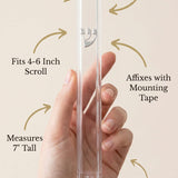 Hand holding a seven-inch Timeless Clear Silver Shin Outdoor Mezuzah made in Israel from waterproof acrylic
