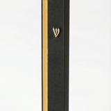 Sleek aluminum Mezuzah in black and gold with screw cap, suitable for outdoor use, fitting a 5-inch scroll, mounted with strong tape, crafted in Israel.