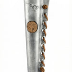 Pewter mezuzah embedded with replica of an ancient Shekel coin from Jewish revolt against Rome, detailed and faithfully preserved.