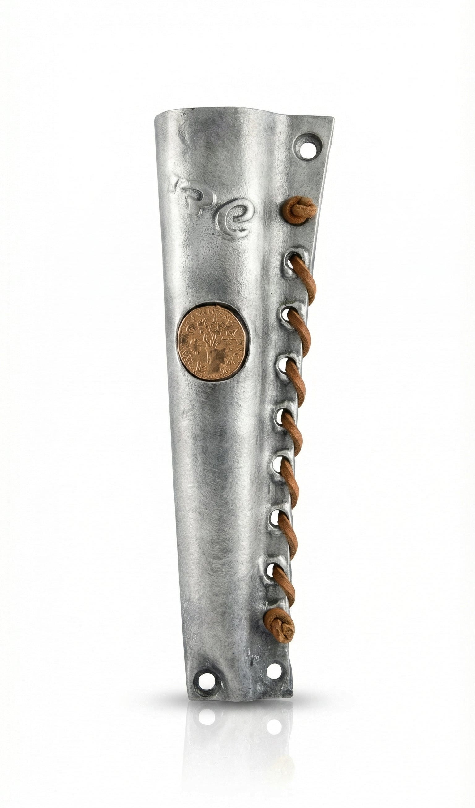 Pewter mezuzah embedded with replica of an ancient Shekel coin from Jewish revolt against Rome, detailed and faithfully preserved.