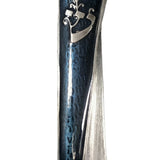 Elegant pewter mezuzah with midnight blue enamel, shaped like a scroll unrolling to reveal angels' names, displayed on a polished white surface with soft reflection.