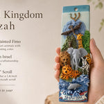 Hand-held animal kingdom mezuzah with colorful safari animals and Shalom banner, perfect for children's rooms and family spaces.