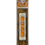 High-resolution image of an April Mezuzah, made in the USA, positioned against a clean white background with a subtle reflection beneath.