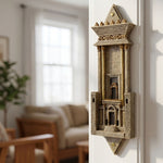 Interior view of a Jewish home showcasing an architectural Beit Hamikdash mezuzah case on a doorway jamb, made in Israel with detailed craftsmanship.