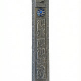 A finely detailed Pewter Mezuzah, 6.25 inches tall, made in USA, with Hebrew inscriptions and decorative motifs, on a white studio background.