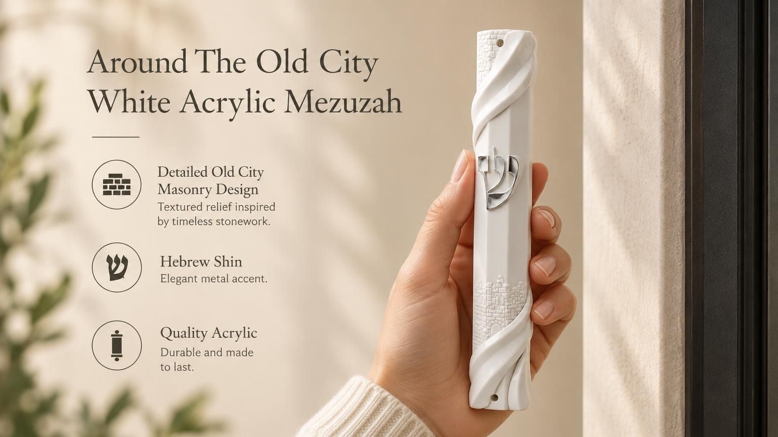 Person holding an opaque white acrylic mezuzah with Jerusalem-inspired wall relief and a silver Shin.
