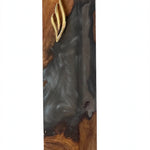 Artistic Olive Wood Charcoal Black Resin Mezuzah on a white background, a handmade Israeli olive wood mezuzah with marbled charcoal resin flowing through the grain and a gold Shin, fitting a kosher scroll up to 6 inches