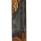 Artistic Olive Wood Charcoal Black Resin Mezuzah on a white background, a handmade Israeli olive wood mezuzah with marbled charcoal resin flowing through the grain and a gold Shin, fitting a kosher scroll up to 6 inches