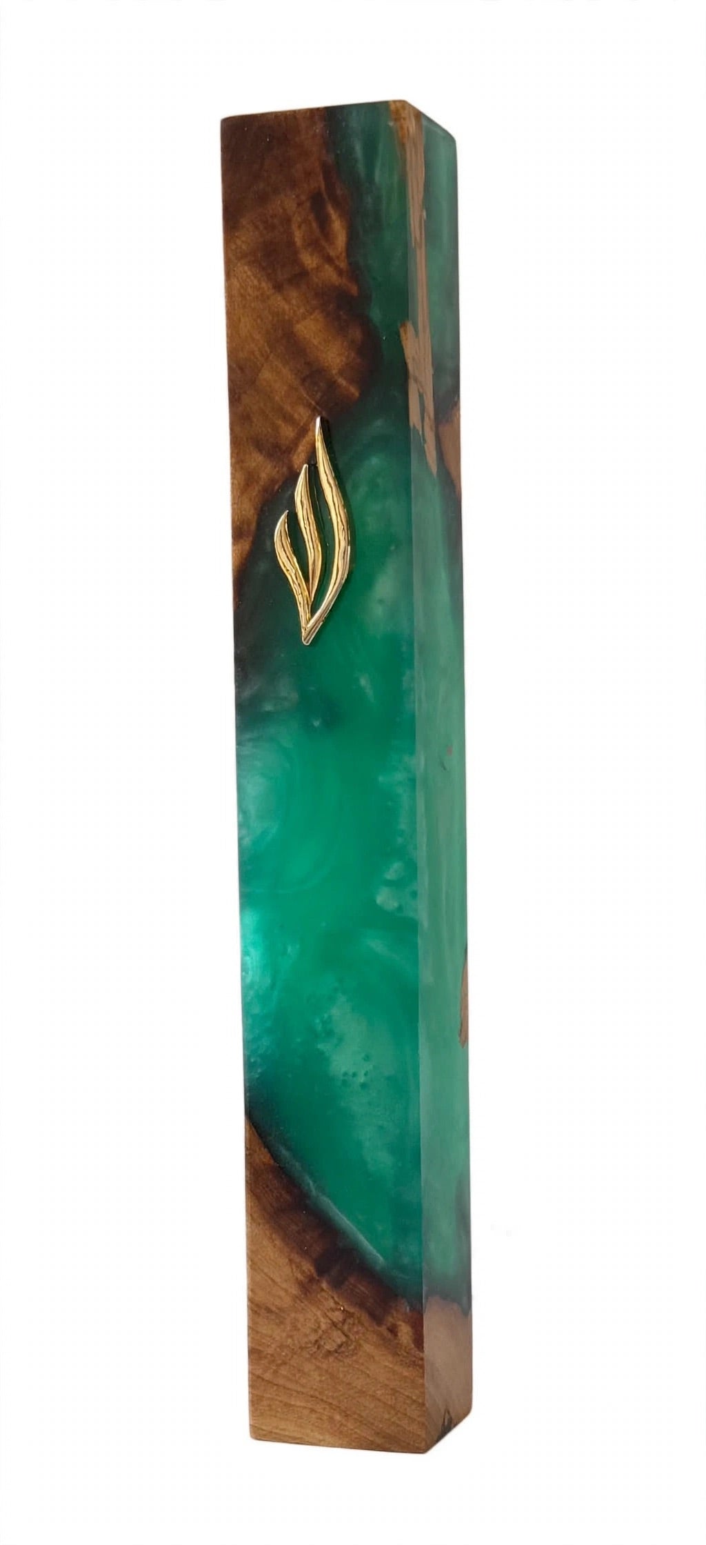Angled studio view of the Artistic Olive Wood Emerald Green Resin Mezuzah, an olive wood mezuzah case from Israel with translucent emerald resin, rich brown wood grain and a gold Shin, holding a 6-inch kosher scroll