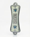 Front view of Pearlescent Kotel Heart white pewter mezuzah with hand-painted enamel, raised Shin and blue heart-shaped Stars of David