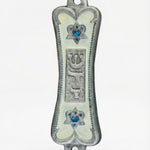 Front view of Pearlescent Kotel Heart white pewter mezuzah with hand-painted enamel, raised Shin and blue heart-shaped Stars of David