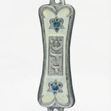 Front view of Pearlescent Kotel Heart white pewter mezuzah with hand-painted enamel, raised Shin and blue heart-shaped Stars of David
