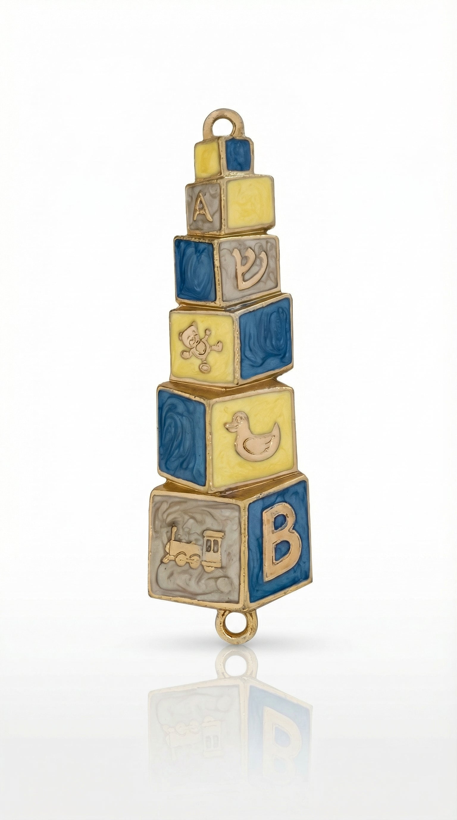 Hand painted blue and yellow baby mezuzah made of brass with enamel paint, 4 inches tall, displayed on a white background with soft reflection.