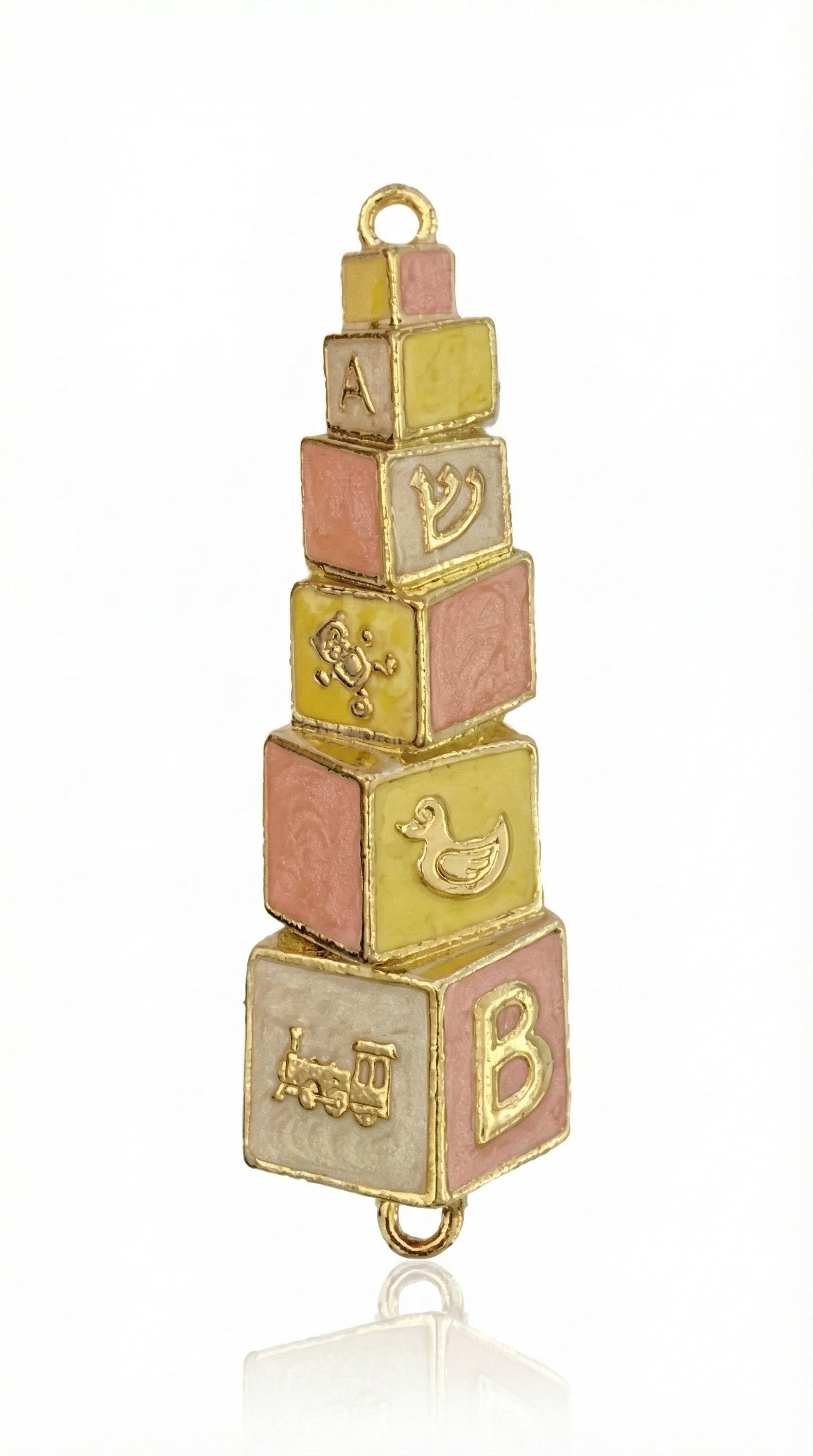 Hand-painted brass baby mezuzah in pink and yellow, 4 inches tall with Hebrew inscription, designed for nursery decor, with a bright white background.