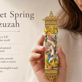 Premium Ballet Spring mezuzah case held by hand showing its exact shape, color, and details