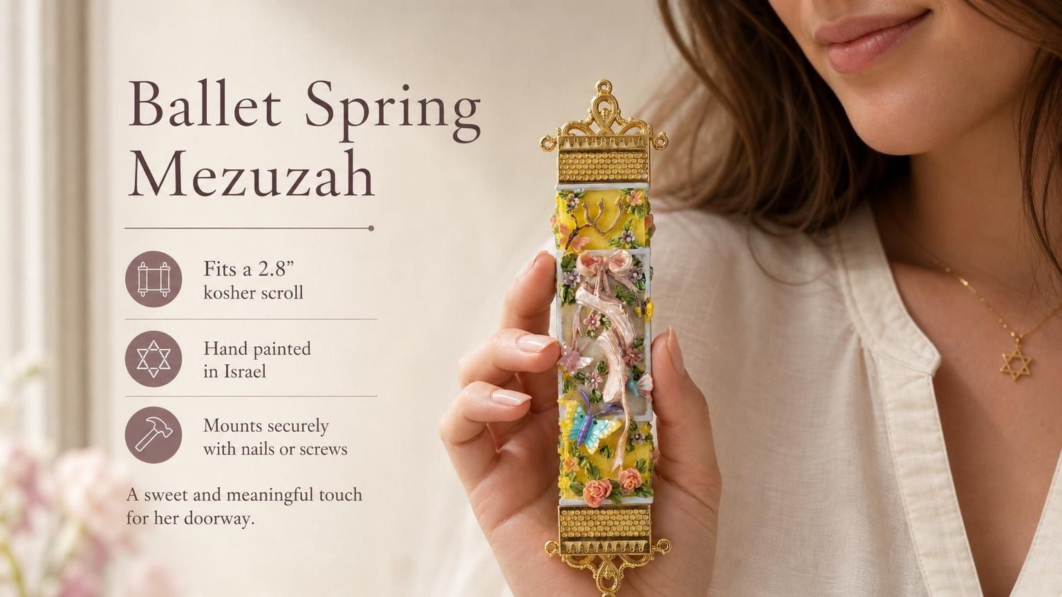 Premium Ballet Spring mezuzah case held by hand showing its exact shape, color, and details