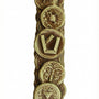 Brass Bar Kochva coin mezuzah with detailed engraved Hebrew letters and archaeological inscription, displayed on a white studio background with subtle reflection.