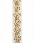Elegant gold-edged Jerusalem stone mezuzah with detailed embellishments, handcrafted in Israel, showcasing intricate design and texture.