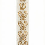 Elegant gold-edged Jerusalem stone mezuzah with detailed embellishments, handcrafted in Israel, showcasing intricate design and texture.