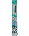Upscale, detailed Ocean Mezuzah made of pewter with enamel finish, designed for home doorways, showcasing engraved Hebrew letters and decorative motifs.