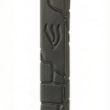 Black cement mezuzah, 6 inches tall, with Hebrew engravings, mounted with strong tape on a white background, detailed craftsmanship.