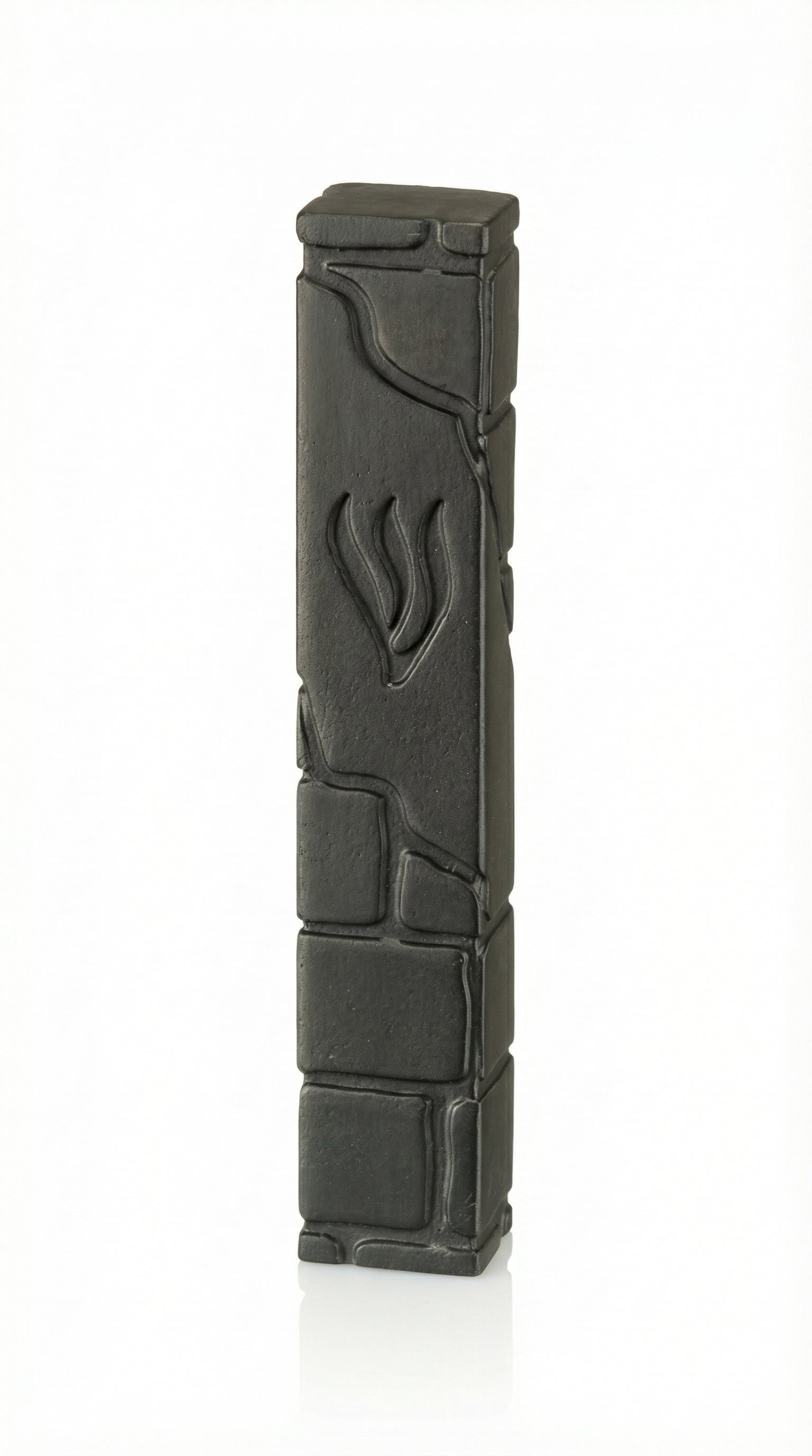 Black cement mezuzah, 6 inches tall, with Hebrew engravings, mounted with strong tape on a white background, detailed craftsmanship.
