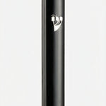 Elegant black lucite mezuzah made in Israel, 3.5 inches tall with detailed Hebrew engravings, designed for home doorways.