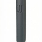 Black cement Mezuzah, 6 inches tall, with Hebrew engraved symbols, mounted with strong tape on a white background, interior use.