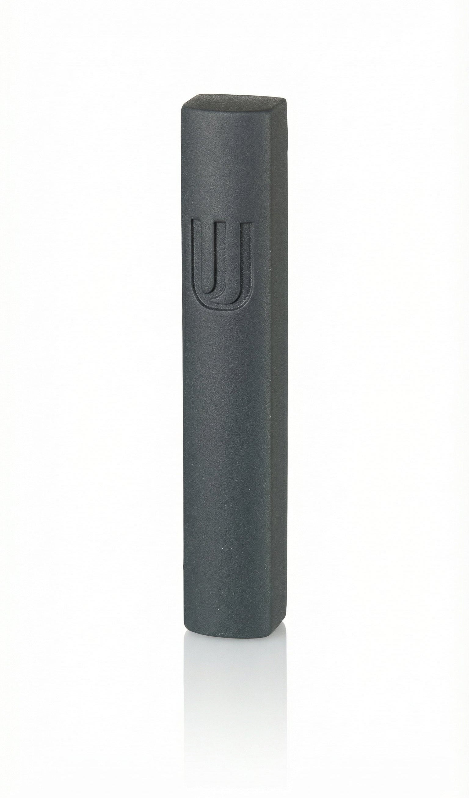 Black cement Mezuzah, 6 inches tall, with Hebrew engraved symbols, mounted with strong tape on a white background, interior use.
