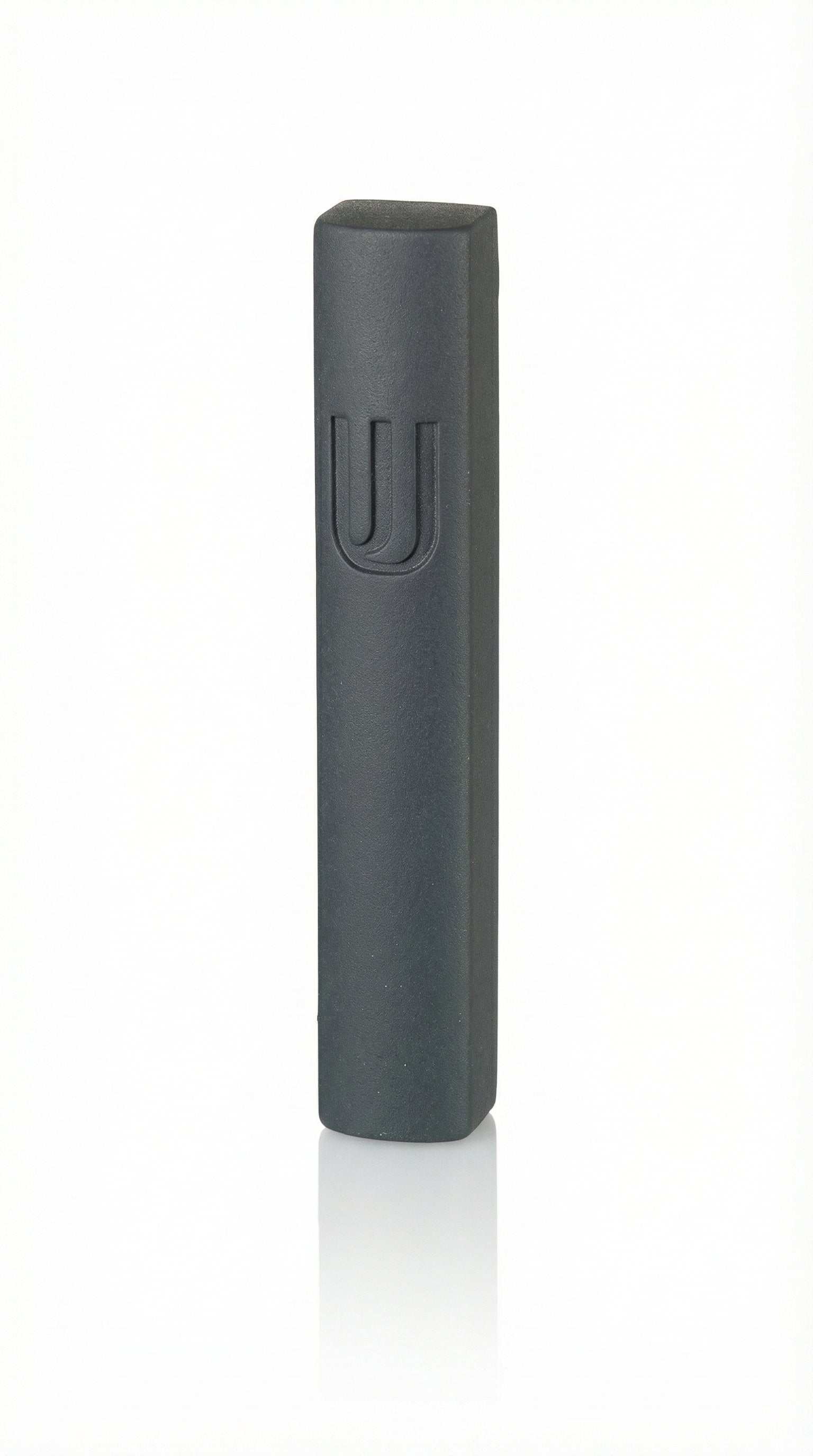 Black cement Mezuzah, 6 inches tall, with Hebrew engraved symbols, mounted with strong tape on a white background, interior use.