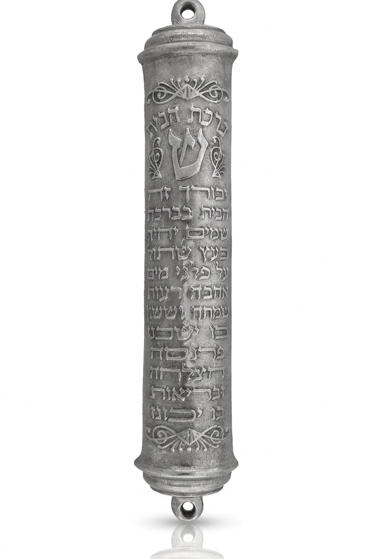 Large pewter mezuzah with traditional blessing inscription, 7 inches tall, designed for Jewish home doors, with clear engraved Hebrew text and decorative motifs.