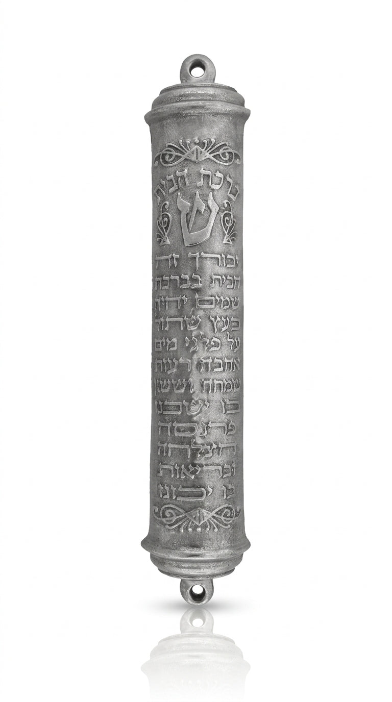 Large pewter mezuzah with traditional blessing inscription, 7 inches tall, designed for Jewish home doors, with clear engraved Hebrew text and decorative motifs.