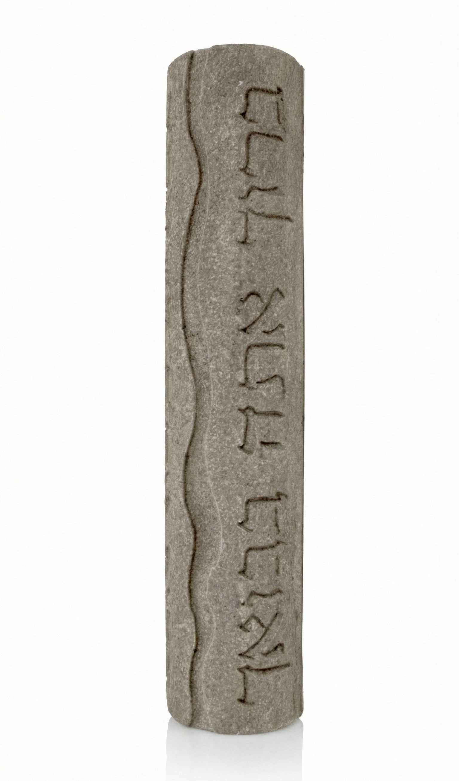 Handmade Mezuzah in Jerusalem stone with Hebrew blessing, home blessing inscription, on a white studio background with soft reflection.