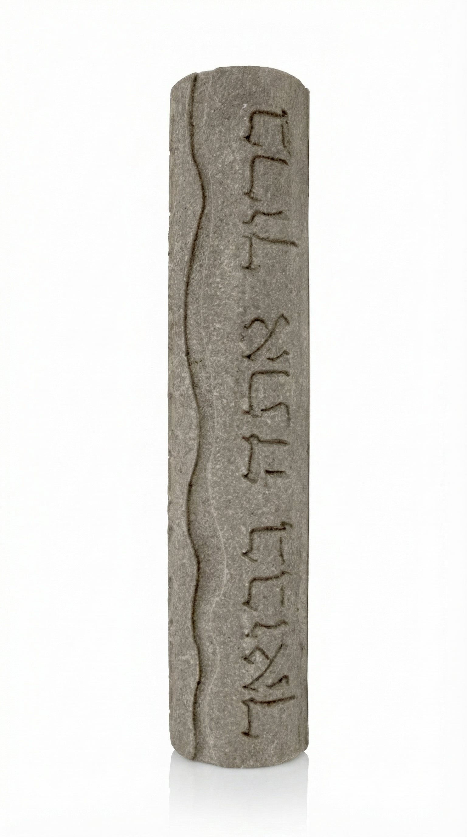 Handmade Mezuzah in Jerusalem stone with Hebrew blessing, home blessing inscription, on a white studio background with soft reflection.