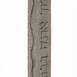 Blessed Upon Your Mezuzah Gray Jerusalem stone mezuzah case with Hebrew home blessing inscription and natural gray stone texture