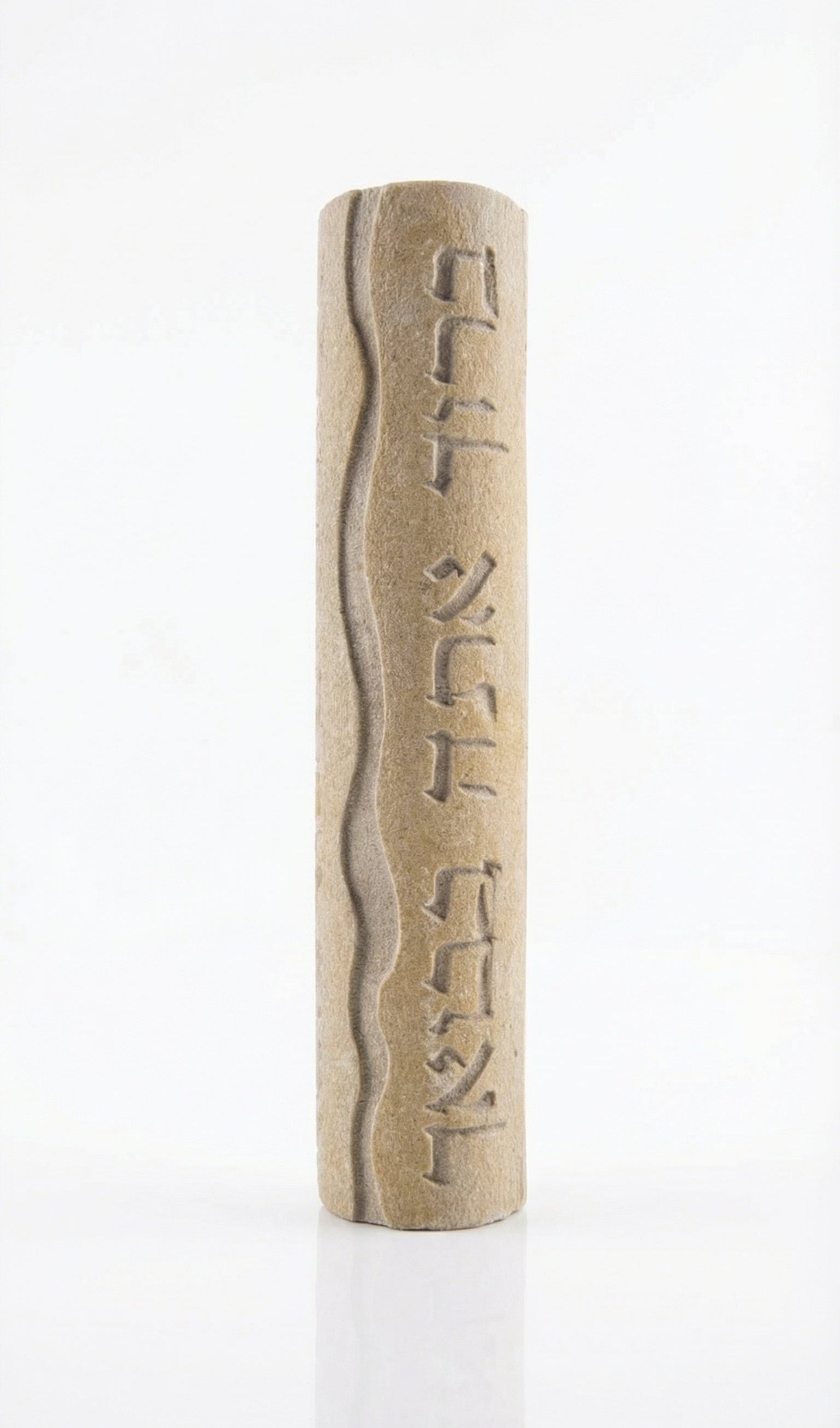 High-resolution image of handcrafted Mezuzah made of Jerusalem stone, engraved Hebrew blessing, on a white studio background with soft reflection.