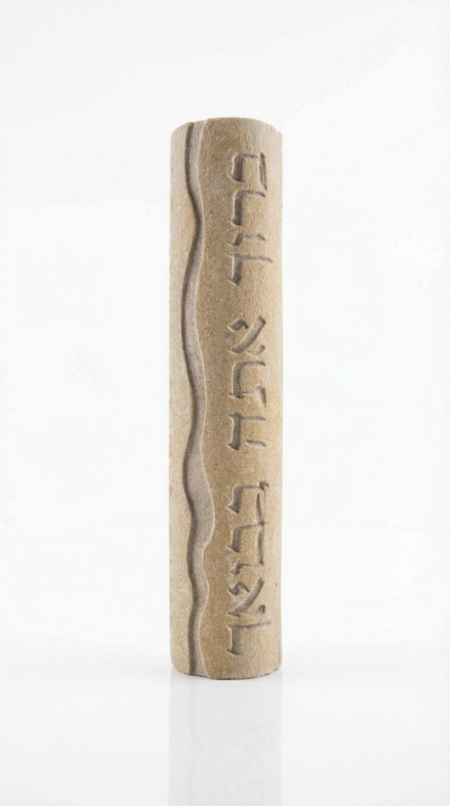 High-resolution image of handcrafted Mezuzah made of Jerusalem stone, engraved Hebrew blessing, on a white studio background with soft reflection.