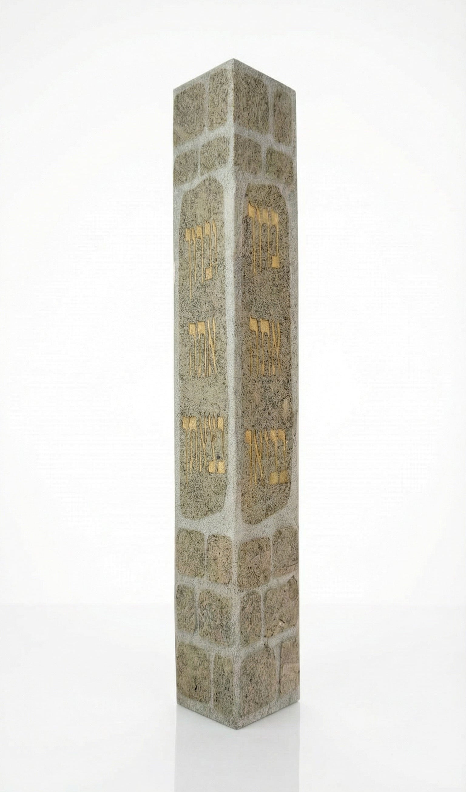 Large handmade Jerusalem stone Mezuzah with engraved Hebrew blessing for home, on a white studio background with soft reflection.