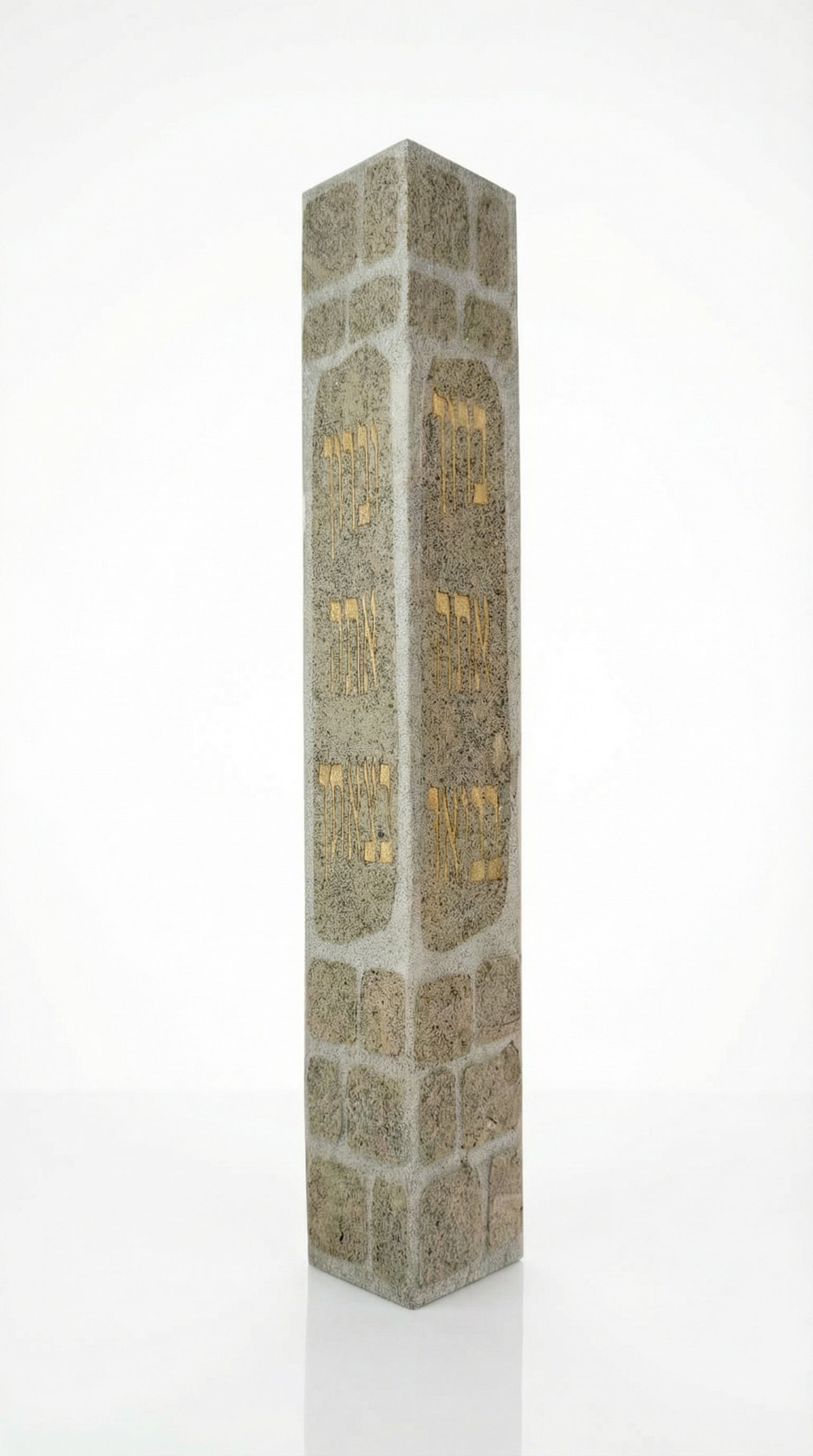 Large handmade Jerusalem stone Mezuzah with engraved Hebrew blessing for home, on a white studio background with soft reflection.