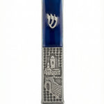 High-resolution image of a blue pewter Jerusalem mezuzah with detailed Hebrew engravings, set against a pure white background with a soft reflection.
